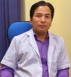 Dr. Kamin Moyong